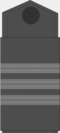 Урядник (чин) ком.png